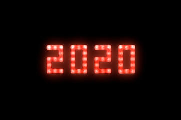 Red neon glowing led 2020 sign on black