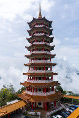 Chinese temple at Genting highland. Clouds above mountains. Malaysia