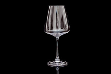 glass of wine on a green background