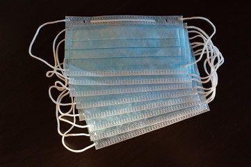 Medical masks on a black background