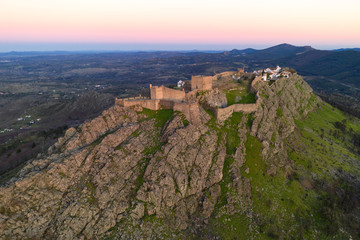 Fototapeta na wymiar Marvao drone aerial view of the historic village and Serra de Sao Mamede mountain at sunset, in Portugal