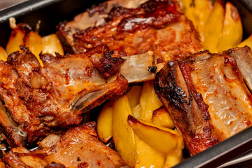 Potatoes in sauce with ribs