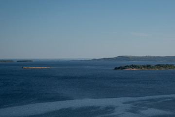 Volga river and islands near Saratov, Russia. Railway bridge in the background.