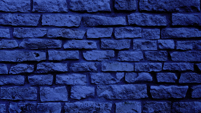 Dark blue brick wall texture background