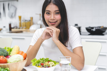 Obraz na płótnie Canvas Eat green for wellness. Young girl enjoy eating vegan.