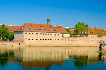 Strasbourg, France, Alsace. The Ill river and embankments with old houses