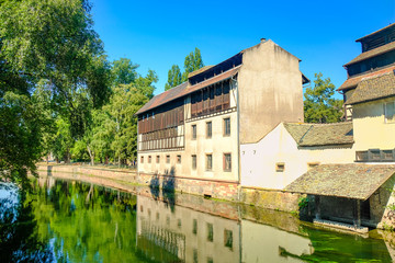 Strasbourg, France, Alsace. The Ill river and embankment with old houses