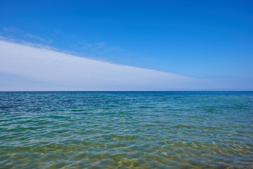 Blue sky and blue water at the Baltic sea