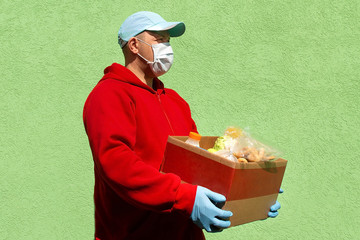 man with a box of food, help and donation of food