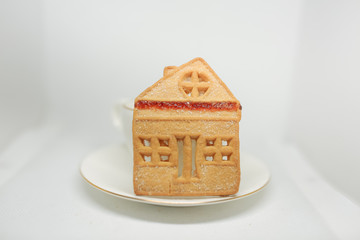 cookies in the form of a house. stay at home. pandemic coronavirus. baking during quarantine