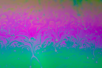 Fototapeta na wymiar Psychedelic background surface of colorful soap bubble