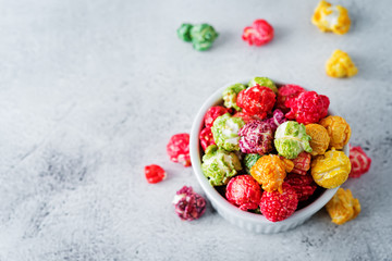 Multicolor caramel sweet Popcorn in a white bowl