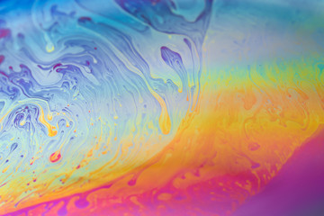 abstract background iridescent paint, colors iridescent interference rainbow on a soap bubble