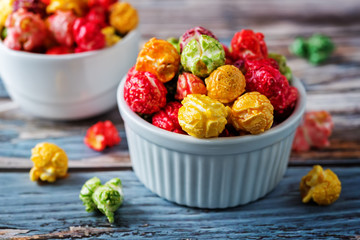 Multicolor caramel sweet Popcorn in a white bowl