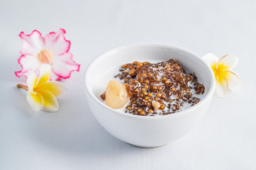 Thai desserts, sago desserts with longan topped with coconut milk