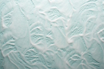 Soap and foam on a light background with place for text.