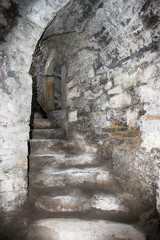 Narrow corridor inside the medieval Kamianets-Podilskyi fortress, Ukraine