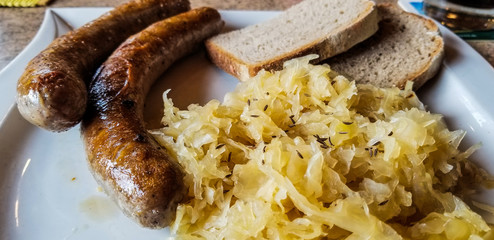 German sausage and sauerkraut with bread