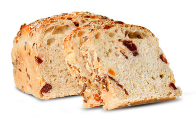 Slice of bread with inclusions of fruits and seeds on a white isolated background. Clipping path. Close-up.