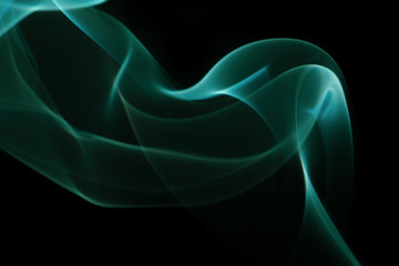 Abstract overlay green  smoke in shape of lightning on black background