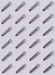 Realistic test tubes with blood sample for COVID-19 test. Seamless pattern. Coronavirus Covid 19 test tubes pattern. 3d render
