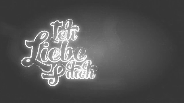 german i affection yourself ich liebe dich written with chalk using curly offset over a black blackboard suggesting message left by beloved