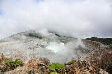 Poás Volcano covered by smoke in Costa Rica