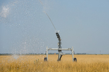 Irrigation system working on a field