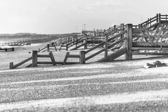 black and white photo of the beach in england
