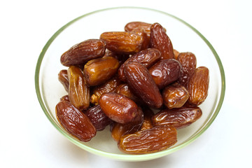 dried dates on a white background