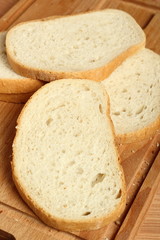 Sliced bread on cutting board