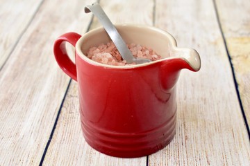 Salt for kitchen use and cooking in attractive pottery jug and shakers