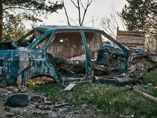 Abandoned and destroyed cars, post-apocalyptic look.