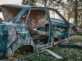 Abandoned and destroyed cars, post-apocalyptic look.