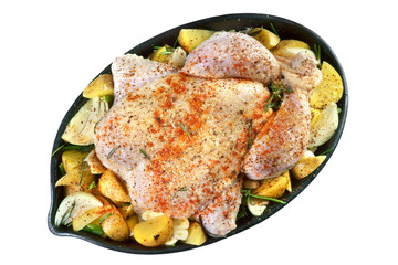 raw chicken with spiced potatoes