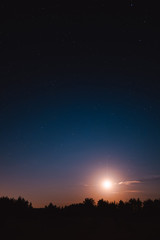 Landscape with Moon. Night sky with stars. Beautiful night sky photo taken in Ukraine during a clear night