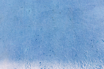 Grunge Blue painted on cement background and texture