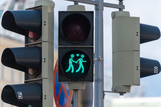 Crossing Light in Vienna Austria with Couple Holding Hands