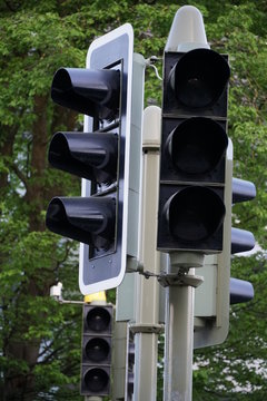 shut off stoplights or traffic lights in detail in a a residential district in Switzerland 