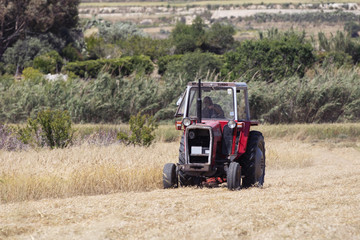 chadwick lakes, rabat malta, 05-02-2020 shot of a farmer in tractor seeding, sowing agricultural crops at field