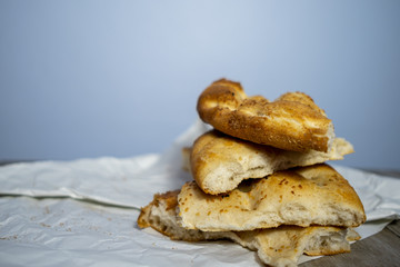 Ramadan concept about solidarity, close-up of the 4 pieces of pita in a row on the table.