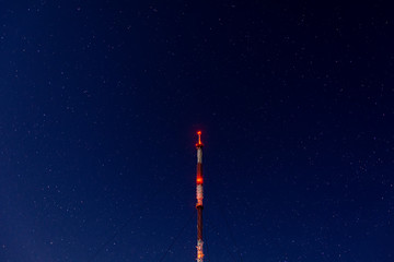 radio tower on night starry sky background