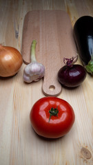 Vegetables composition on wood background