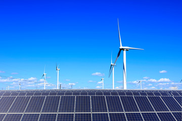 Solar photovoltaic panels and wind turbines.