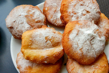 Donuts with cream and powdered sugar in Tbilisi, Georgia