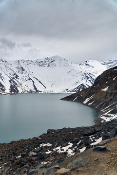 lake and mountains with snow
