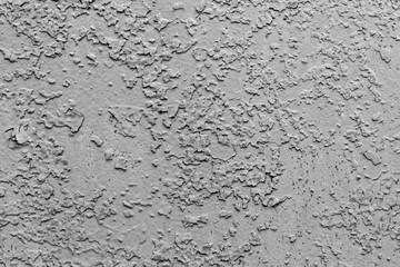 Wall covered with old cracked paint, grunge texture, white and black
