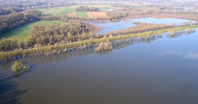 Aerial footage of flooded floodplain with dikes in Lonjsko polje, Croatia