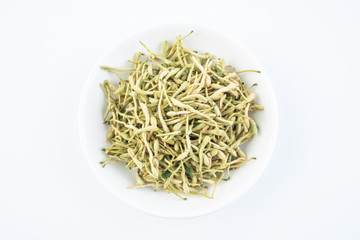 Dried honeysuckle and fresh honeysuckle buds