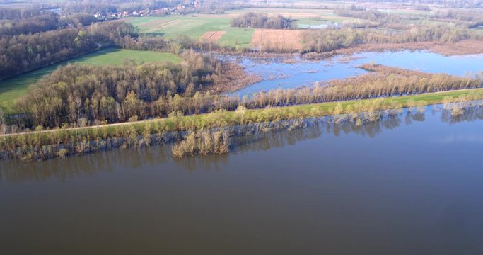 Aerial footage of flooded floodplain with dikes in Lonjsko polje, Croatia